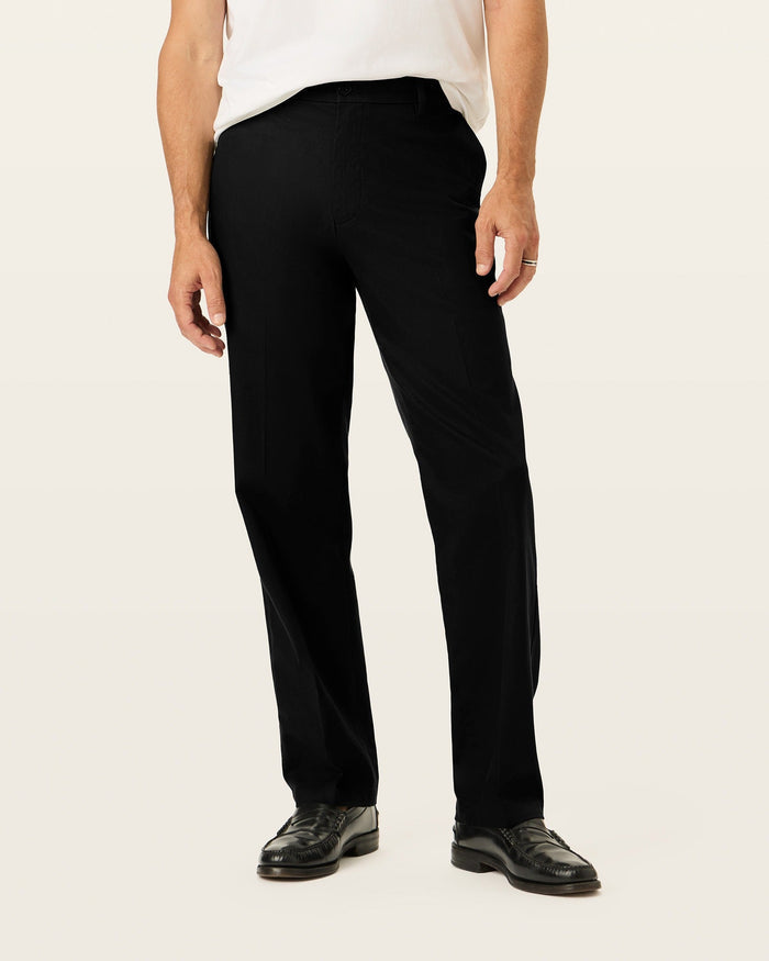 View of model wearing Beautiful Black Signature Iron Free Khakis, Classic Fit with Stain Defender®.