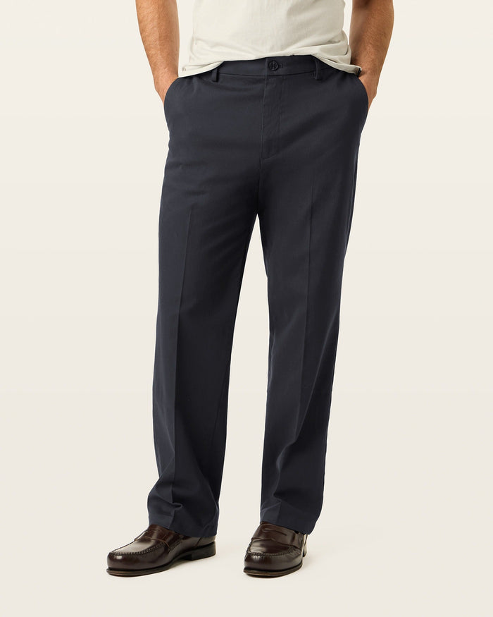 Side view of model wearing Steelhead Signature Iron Free Khakis, Relaxed Fit with Stain Defender®.
