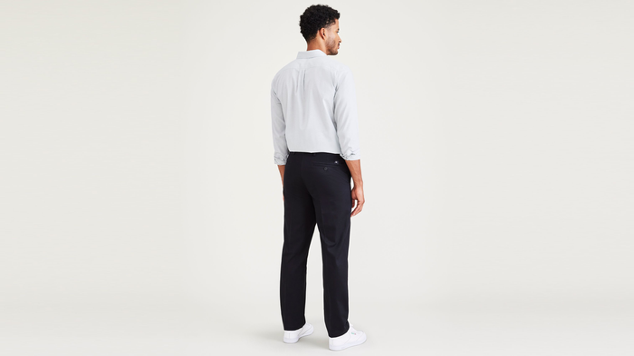 Back view of model wearing Beautiful Black Signature Iron Free Khakis, Straight Fit with Stain Defender®.
