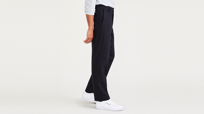 Side view of model wearing Beautiful Black Signature Iron Free Khakis, Straight Fit with Stain Defender®.
