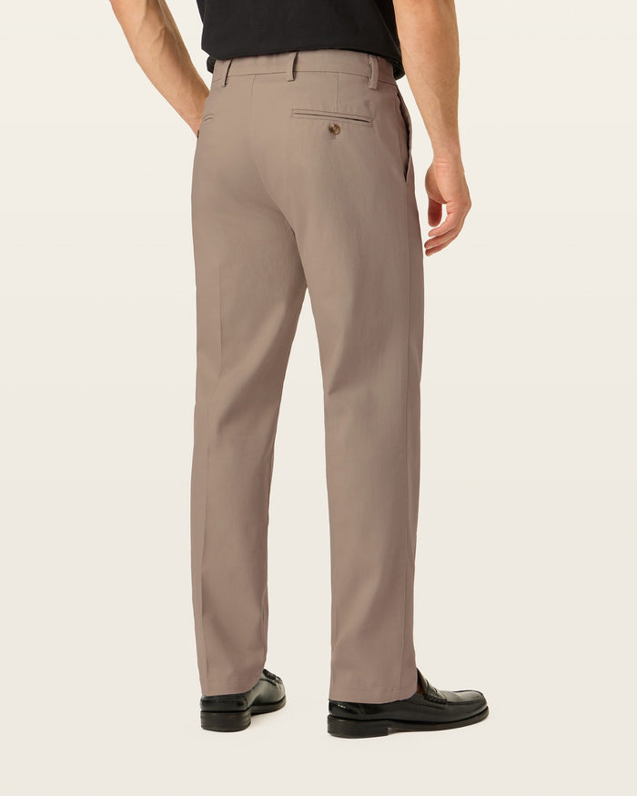 Back view of model wearing Timber Wolf Signature Iron Free Khakis, Straight Fit with Stain Defender®.