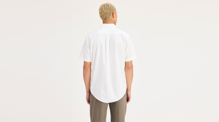 Back view of model wearing Lucent White Signature Stain Defender Shirt, Classic Fit.