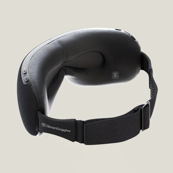 SmartGoggles 2 | Therabody black wellness device designed for eye recovery and relaxation with adjustable strap and control buttons for personalized comfort.