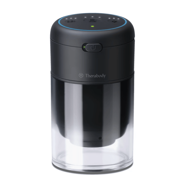 TheraCup | Therabody wellness device with a sleek black top and clear base, designed for recovery and body care in a compact form.