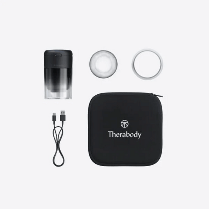 TheraCup | Therabody recovery tool set including a rechargeable massage cup, two attachment rings, a USB charging cable, and a black carrying case with Therabody branding for wellness and body care.