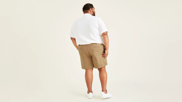 Back view of model wearing New British Khaki Ultimate 9.5" Shorts (Big and Tall).