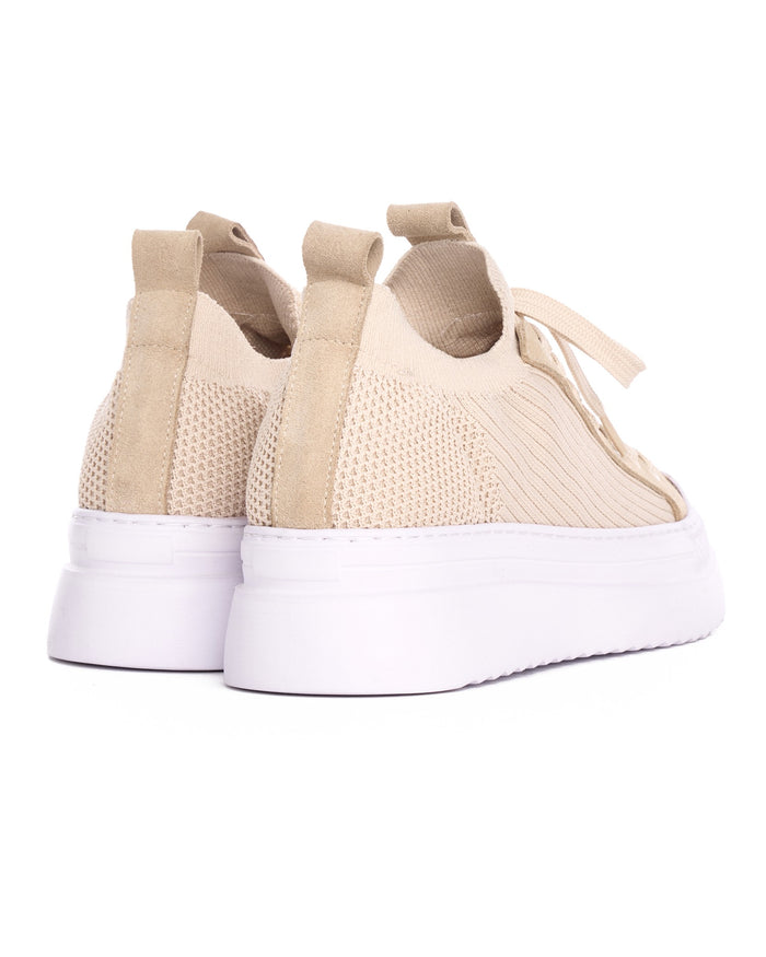 Martin Valen Valento knitwear beige sneakers rear three-quarter view highlighting knit heel texture and pull tabs