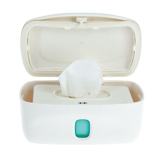 The Nuby Wipe Dispenser is a white plastic container with an open lid showing a wipe ready to use. It features a green button on the front and includes a weighted plate for easy diaper changes.