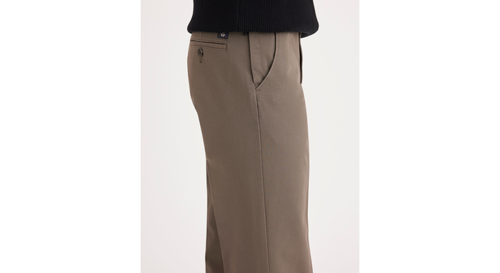 Side view of model wearing Dark Pebble Workday Khakis, Classic Fit (Big and Tall).