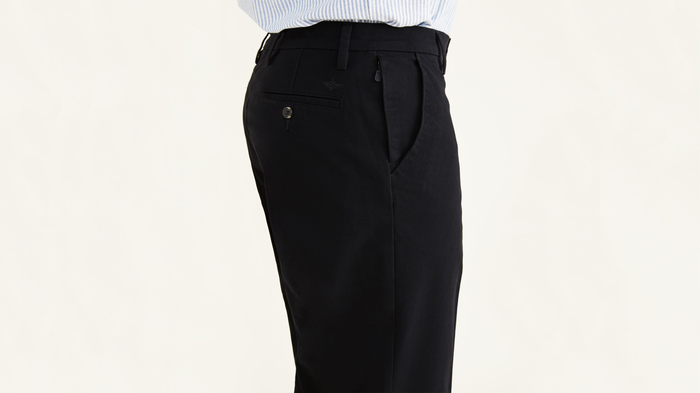 View of model wearing Black Workday Khakis, Classic Fit (Big and Tall).