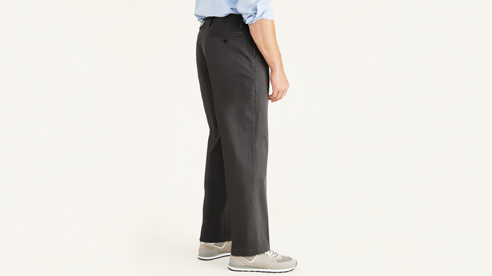 Side view of model wearing Storm Workday Khakis, Classic Fit (Big and Tall).