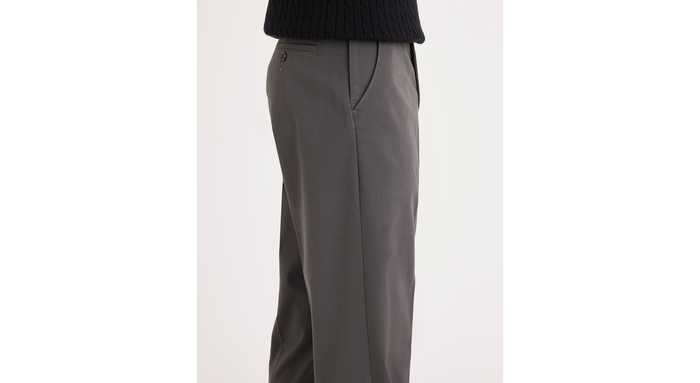 Side view of model wearing Storm Workday Khakis, Classic Fit (Big and Tall).