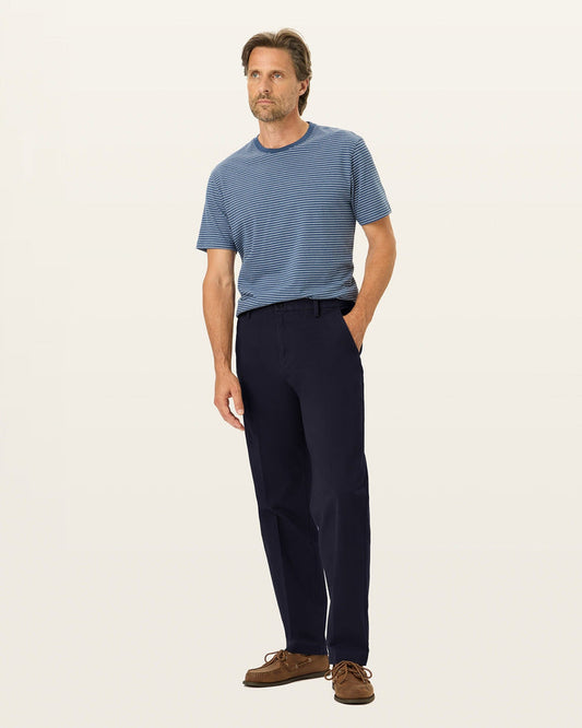 Front view of model wearing Pembroke Workday Khakis, Classic Fit.