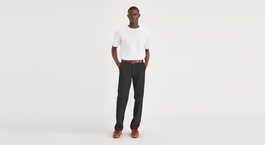 Front view of model wearing Black Workday Khakis, Straight Fit.